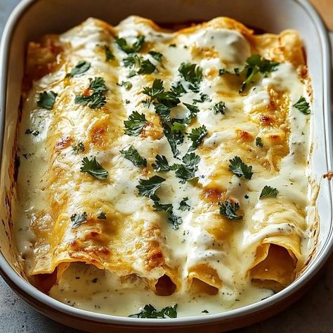 Chicken Enchiladas With Sour Cream, Creamy Cheesy Chicken, William Sonoma Recipes, Cheesy Chicken Enchiladas, William Sonoma, Pizza Rolls, White Sauce, Cheesy Chicken, Chicken Enchiladas