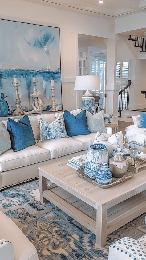 55 Coastal Living Room Ideas To Make Your Home Cozy And Classy Holiday Homes Interiors, Coastal Living Room Furniture Ideas, Coastal Theme House, Blue House Theme, Seaside Decor Living Room, Coastal Granddaughter Living Room, Beach Vibe Living Room, Hamptons Style Decor Living Rooms, Coastal Home Decor Ideas