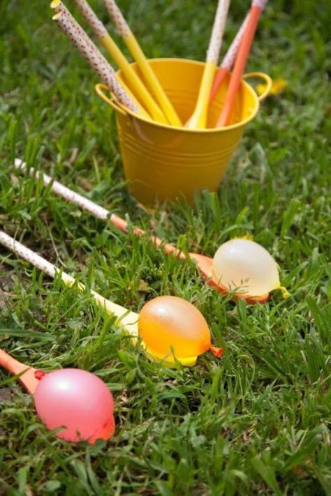 Water Egg on a Spoon – Forget that egg on a stick race (yuck, all that yoke to clean up!). Opt instead for "egg" water balloons when organizing this Easter's team races. All the fun, none of the mess. Let's be honest — you're the true winner. Click through to see the whole gallery and for more easter games. Water Balloon Games, Egg And Spoon Race, Balloon Games, Colored Eggs, Easter Games, Water Games, Birthday Party Planning, Water Balloons, Kids Party Games