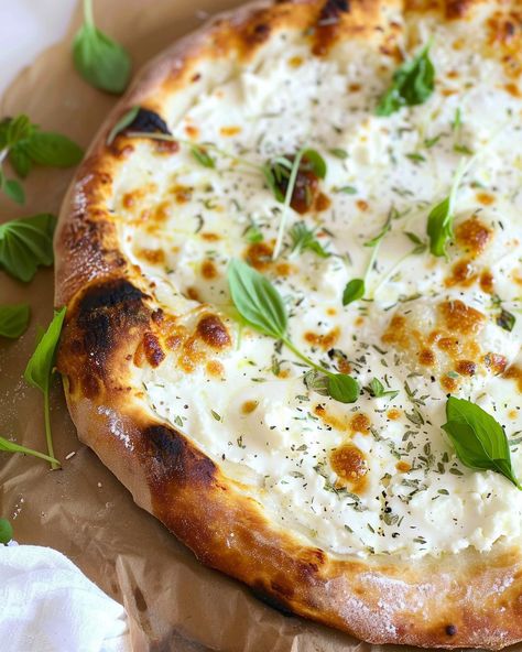 Garlicky White Pizza with Mozzarella and Ricotta If you’re a pizza lover and enjoy experimenting with new flavors, this Garlicky White Pizza with Mozzarella and Ricotta is a must-try. It’s ... Read more Ricotta Pizza Ideas, White Pizza With Zucchini, Zucchini Ricotta Pizza, Ricotta On Pizza, Chicken Ricotta Pizza, Pesto Ricotta Pizza, White Pizza With Ricotta Cheese, Ricotta Pizza Sauce, Whipped Ricotta Pizza