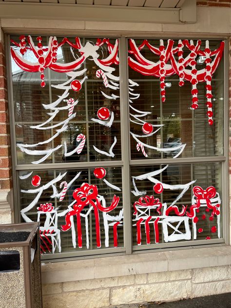 White and red simple christmas tree and presents and decorations. Christmas Window White Pen, Christmas White Pen Window, Christmas Snow Window Art, Santa Peeking In Window, Snow Graffiti Window, Green Christmas Decorations, Christmas Window Painting, Christmas Window Display, Silhouette Christmas