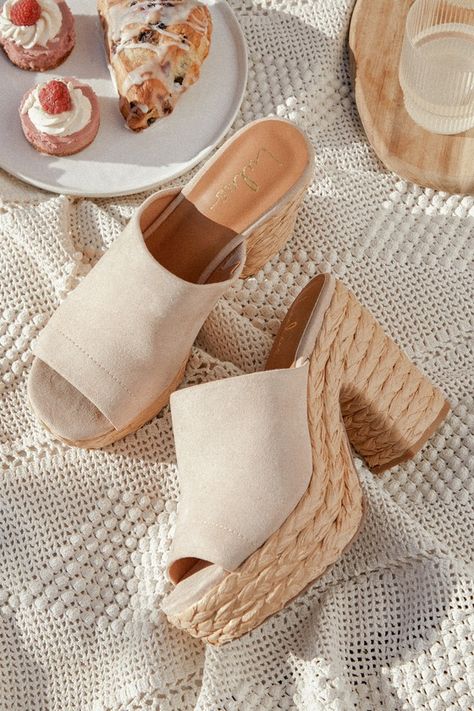 To complete any summer-ready ensemble, you're going to need the Lulus Ervyn Light Nude Suede Raffia Platform Slide Sandals! Smooth faux suede shapes a peep-toe upper and a wide toe strap (with a stretchy elastic gusset at the instep) that sits atop a contrasting 1.5"" raffia-wrapped toe platform and a matching block heel. An easy slip-on design makes these chic heels a must-have for any sunny weather occasion! 4. 25" wrapped block heel. Cushioned insole. Felted rubber sole has nonskid markings. Trendy Footwear, Bridal Sneakers, Platform Slide Sandals, Work Outfits Women Summer, Chic Heels, Chic Sandals, Trending Sandals, Summer Work, Sunny Weather