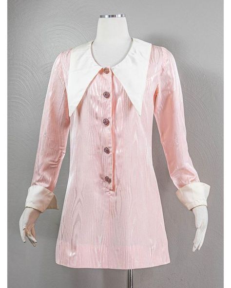 The_Romantiquary on Instagram: "Sold: This fun and funky 60s pastel pink mini dress is now available. The dress has a very large dagger collar and matching cuffs. It snaps up the front with lovely faux pink rhinestone buttons down the font. The dress fits closet to a size medium with a 37” bust you can find the full info through the link in my bio. . . . . . . . . #daggercollar #discoqueen #1970s #psychedelicfashion #vintagebarbie #vintagewidelegpants #vintagepartydress #valintinesday #60sset # Dolly Girl Fashion 60s, Pink Mod Dress, 1960s Pink Dress, 60s Fancy Dress, 60s Coquette, 60s Mod Dress, 80s Inspired Outfits, 1960s Mini Dress, 60s Mini Dress