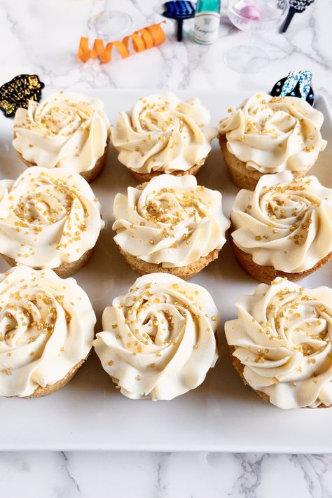 Cream Color Cupcakes, Cream Colored Cupcakes, Gold Cupcakes Ideas, Champagne Buttercream, Forbes List, Cake Base Recipe, Pink Champagne Cupcakes, Buttercream Recipes, Anniversary Cupcakes