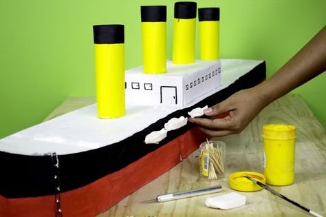 On April 14, 1912, on her maiden voyage, the mighty Titanic sank in the cold Atlantic waters off the coast of Canada. In the many years since, the Titanic has been remembered in song, cinema and numerous books. You can build a model of this famous White Star ocean liner using simple materials. Making a paper model of the Titanic is a great project... Titanic Boat, Titanic Model, Make A Boat, Build Your Own Boat, Black Construction Paper, The Titanic, Paper Model, Valentine Box, Boat Plans