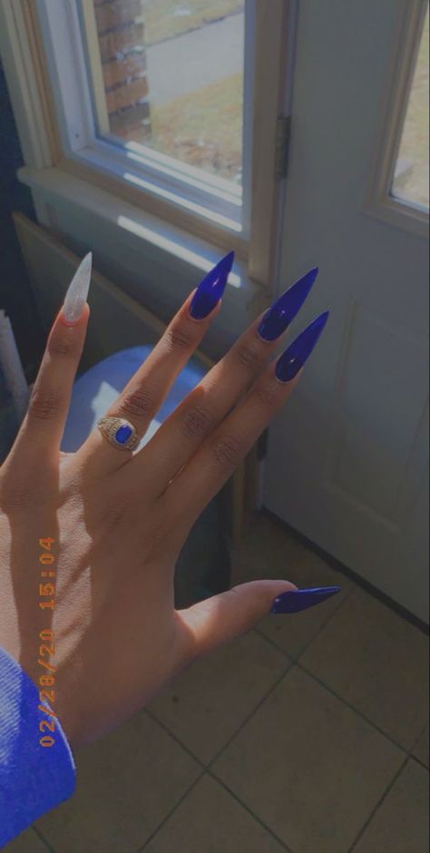 Blue stiletto Royal Blue Almond Acrylic Nails, Blue Stelito Nails, Royal Blue Nails Almond Shape, Royal Blue Sparkle Nails, Royal Blue Nail Ideas For Prom, Blue Stilletos Nails, Royal Blue Toe Nails, Royal Blue Stiletto Nails, Blue Fire Nails