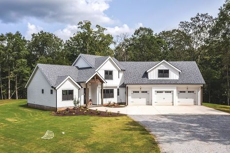 AD House Plans on Instagram: “Let's take a mini-tour of this beauty! 🏡 ⁠⠀ ⠀ Our builder-client 👉 @bleconstructionservices w/ @evanco_homestead 👈 built an absolutely…” Add On Garage To House, Clapboard Siding Exterior, Farmhouse With Angled Garage, Two Shower Heads, Vaulted Porch, Multigenerational House Plans, Multigenerational House, Angled Garage, Garage Entrance