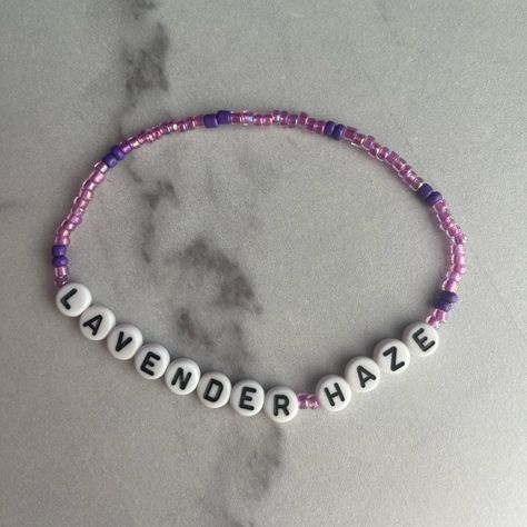 Taylor Swift Eras Tour Themed Friendship Bracelet. Made From Glass And Plastic Beads And Stretchy Elastic Band. Fits Most Teen And Small Adult Wrists. Great For Gifting Or Trading! Purple And Pink Beads With “Lavender Haze” Lyrics Spelled Out. Bundle For Best Deal. Custom Orders Available Upon Request. Taylor Swift Friendship Bracelet Eras Tour You’re On Your Own Kid (Yoyok) Trading Gift Swiftie Fan Swiftie Fan Lavender Haze Bracelet, Lavender Haze Lyrics, Concert Bracelets, Taylor Swift Friendship Bracelet, Lavender Haze, Taylor Swift Eras Tour, Taylor Swift Eras, Band Fits, Taylor Swift Concert