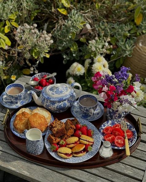 Karen S Burns on Instagram: "A special sunny Burleigh Sunday Tea Tray today, as it’s their 173rd birthday!   I’m serving everything on Blue Arden, Blue Regal Peacock and Blue Felicity for a pretty tea tray in the cottage garden.  On my tea tray this week we have:   Homemade three cheese scones (buttered)  Local tomatoes  Homemade BeRo Sponge Drops with Homemade Strawberry Jam  Local Strawberries  Homemade Farmhouse Fruit Cake Pot of Earl Grey Tea   Served on the terrace in the garden, after a FABULOUS day out to Gunby Hall (photos to follow) with freshly picked flowers from our garden.  Have a LOVELY Sunday wherever you are, and Happy Birthday Burleigh! Karen   #sundayteatraysupper #sundaytea #sundayteatray #cottageliving #cottagecoretea #berocookbooks #berobaking #vintagebakes #burleighch Cottagecore Tea, Sunday Tea, Picked Flowers, Lovely Sunday, Homemade Strawberry Jam, Cheese Scones, Pretty Tea, My Tea, Three Cheese