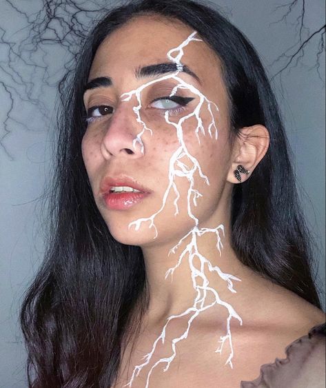 Thunderstorm Makeup Look, Storm Makeup Look, Lightening Makeup Looks, Lightning Scar Face, Dripping Eye Makeup, Lightning Marks On Skin, Lighting Bolt Makeup Look, Lighting Bolt Face Paint, Lightening Face Paint