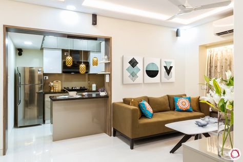 Space Saving Ideas for Small Flats in Mumbai | Designer Tips Small 1 Bhk Interior Design, 1 Room Kitchen Interior Indian, Open Kitchen Ideas Indian Small, Small Home Open Kitchen And Living Room, Open Kitchen Partition Ideas Indian, Hall With Open Kitchen Design, 2bhk Home Interior Design, Interior Design Open Kitchen Living Room, Small Home Interior Design Indian Simple