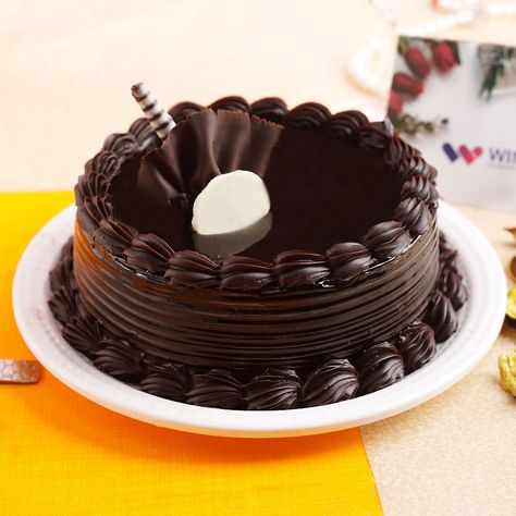 Looking for delicious cakes to be delivered right to your doorstep in #Faridabad? Look no further! We offer a wide variety of #cakes for all occasions and we deliver to all areas of Faridabad. Book your order today! Cake Designs Half Kg, Truffle Cake Designs, Chocolate Truffle Cake Designs, Choco Truffle Cake, Choco Truffle, Online Birthday Cake, Truffle Cake, Order Cakes Online, Cakes Design