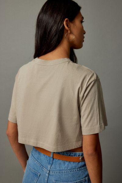 BDG's take on the effortless boyfriend tee. Crafted from super soft cotton and cropped above the waist. Cut in an easy boxy fit with a crew neckline and dropped shoulders. Made to be lived in - wear your way, every day. Find it only at Urban Outfitters. Features BDG's perfect boyfriend tee Boxy fit that's cropped above the waist Crew neckline UO exclusive Content + Care 100% Cotton Machine wash Imported Size + Fit Model in Ivory is 5’10" and wearing size Small | BDG Boyfriend Cropped Boxy Tee in Boxy Crop Top Outfit, Boxy Crop Top, Perfect Boyfriend, Boxy Tee, Crop Top Outfits, Cropped Tee, Boyfriend Tee, Crop Tee, Crew Neckline