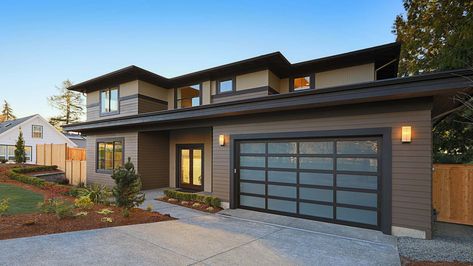 Consumers agree: Buy now before home prices rise #mortgage #feedly Brown Siding, Brown House Exterior, Slope Roof, Aluminium Garage Doors, Glass Garage, Aluminum Garage, Custom Garage Doors, Modern Garage Doors, Impact Doors