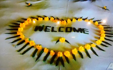 Simple Rangoli for any occasion Welcome Home Flower Decoration, Welcome Flower Rangoli, Welcome Rangoli With Flowers, Welcome Flower Decoration, Vinayaka Photos, Welcome Baby Decoration Ideas, Welcome Rangoli, Welcome Home Decorations, Home Flower Decor