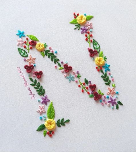 ‎Tehseen Embroidery Works 🌻 صنوبر تحسين‎ on Instagram: "Flower letter "N" embroidery🌹Watch full video tutorial on my YouTube channel 'Infinite Thread Arts'. Link in bio. Dm to order customized floral letters 😍 #handmadeembroidery #handembroidery #handmade #embroiderydesign #embroiderypattern #embroidersofinstagram #embroideryhoopart #embroiderywork #embroidery #embroideryart #embroiderylove #embroideryflowers #letters #embroideries #stitchersofinstagram #needlework #nakış #ricamoamano #ricam Letter N Embroidery, Embroidery Watch, Basic Hand Embroidery Stitches, Flower Letter, Embroidery Letters, Embroidery Works, Thread Art, Flower Letters, Alphabet Design