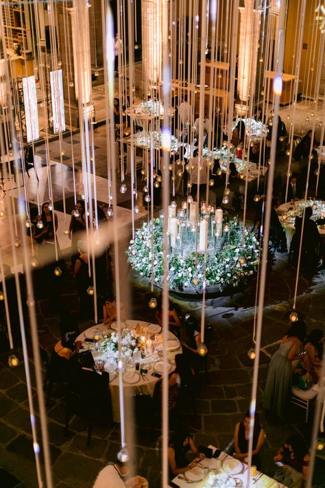 Decor with hanging candles with ivory ribbon for ceiling venue. Hanging Candles Wedding, Wedding Reception Candles, Long Table Wedding, Wedding Ceiling, Candles Wedding, Hanging Candles, Tent Wedding, Wedding Candles, Wedding Florist