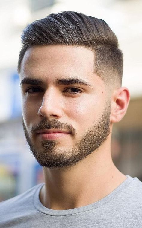 Taper Fade with Subtle Beard - A tapered fade keeps your head cool with this thick top hair. Combing up and sideways creates extra volume with no effort. Mens Comb Over Fade, Mens Comb Over Haircut, Gaya Rambut Emo, Comb Over Fade Haircut, Combover Hairstyles, Short Comb Over, Aladdin Jr, Comb Over Fade, Comb Over Haircut