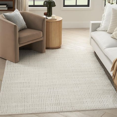 PRICES MAY VARY. STYLISH AND FUNCTIONAL: This minimalist rug effortlessly combines comfort and stress-free maintenance, bringing a relaxed vibe to your home. SOFTLY TEXTURED: The perfect choice for any space where comfort is a priority, thanks to a cozy medium thick polyester pile. EASY CARE: This modern rug is made from polyester yarns that are durable and easy to clean. Vacuum regularly to keep it looking fresh. MEDIUM THICK CONSTRUCTION: The medium thick pile is ideal for placement in your li Light Gray Couch, Minimalist Rug, Minimalist Rugs, Welcome To My House, Eclectic Modern, Scandinavian Rug, 4x6 Area Rugs, Rug Ivory, 5x7 Area Rug