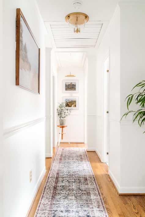 8 Small Hallway Ideas to Make Your Space Look Bigger Basement Hallway Decor, Narrow Landing Ideas Upstairs, Hallway Painting Ideas, Wall Decor Ideas Hallway, Small Hallway Lighting Ideas, End Of Hallway Decor Ideas, Hallway Makeover Before And After, White Hallway Ideas, Small Hallway Decor