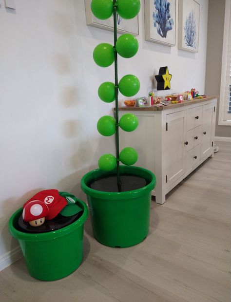 Mario party | CatchMyParty.com Super Mario Theme Halloween Party, Mario Bros Birthday Decoration, Mario Party Table Decor, Super Mario Party Ideas Decoration, Super Mario Halloween Decorations, Mario Bros Theme Party, Mario Birthday Games, Mario Party Decor, Mario Obstacle Course