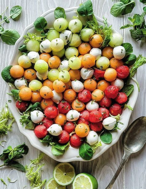 A platter filled with a colourful Agua Fresca Melon Salad dressed with a Hot Honey and Lime Vinaigrette. Fresh mint and lime slices surround the platter. Summer Vegetarian Salad Recipes, Melon Caprese Salad, Brunch Salads Summer, Watermelon Tajin Salad, Melon Fruit Salad, Summer Make Ahead Dinners, Cantelope Salad Recipes, Summer Fruit Board, Melon Ball Salad