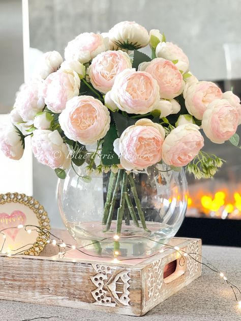 "X-Large Light Pink Rose Peony Arrangement, Artificial Faux Centerpiece, Silk Flowers in Glass Vase for Home Decor * Feel free to contact us if you need more information about the arrangement. * At first look, people might not believe this is a permanent botanical design! * The arrangement contains the finest faux light pink rose peonies arrangement in a bowl glass vase. * The flowers feel so lovely, real, and lively. * All are arranged in a very modern glass vase. Size: 14\" by 14\" Vase: 8\" d Light Pink Flower Centerpieces, Flower Arrangements In Vase, Peonies Arrangement, Faux Flower Centerpiece, Peony Centerpiece, Flowers In Glass Vase, Rose Peonies, Vintage Flower Arrangements, Roses In Vase