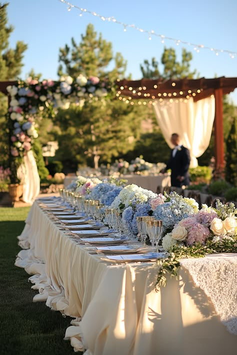 Bring your dream wedding to life with stunning hydrangea floral ideas! These romantic blooms add a touch of elegance and charm to any celebration. Perfect for your decor or bouquet, explore more captivating inspirations!  #WeddingPlanning #HydrangeaWedding #FloralIdeas #WeddingDecor #RomanticWeddings #BridalInspiration #WeddingFlowers #UniqueBridalIdeas #DreamWedding #WeddingAesthetic # florals #WeddingStyle #BridalBouquet #EventInspiration #WeddingTrends Flowers Engagement Party, Hamptons Wedding Aesthetic, Hydrangea Table Centerpiece, Hydrangea Wedding Decor, Wedding Hydrangeas, Garden Wedding Table, Summer Wedding Florals, Elegant Floral Arrangements, Hamptons Wedding