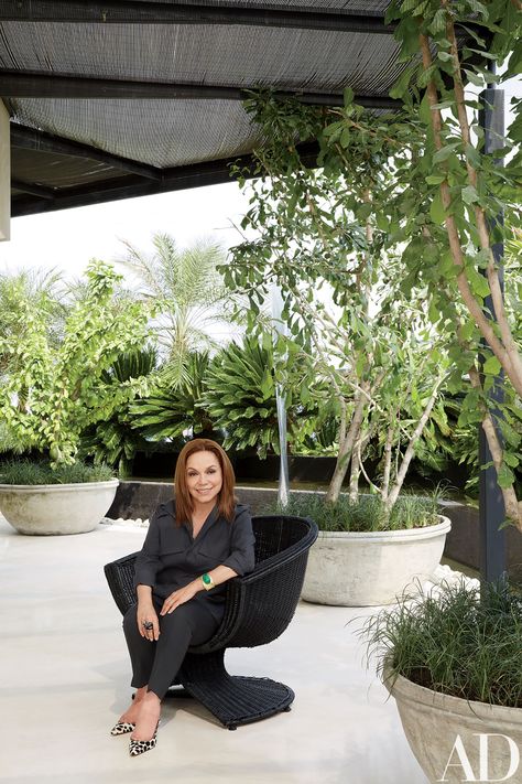 Look Inside Nancy Gonzalez’s Opulent Home in Colombia Colombia Apartment, Nancy Gonzalez Handbags, Manolo Blahnik Mules, Jean Louis Deniot, Home Atelier, Courtyard Pool, Wicker Armchair, Nancy Gonzalez, David Webb