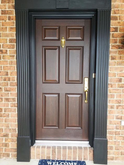 Brown Front Door Paired With Brass Hardware & Black Trim Front Door On Brown House, Front Door Trim Exterior, Dark Brown Front Door, Brown Front Door, Pella Doors, Fiberglass Front Entry Doors, Entry Door Colors, Brown Front Doors, Mahogany Front Door