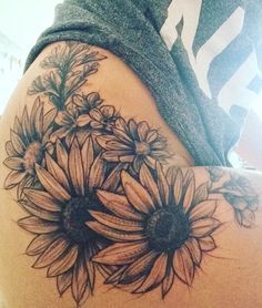 Ladies Thigh Tattoo Ideas, Sunflower Tattoo On Thigh, Big Sunflower Tattoo, Cute Foot Tattoos For Women, Skull And Sunflower Tattoo, Sunflower Thigh Tattoo, Tattoo Planets, Sunflower Tattoo Thigh, Sunflower Tattoo Sleeve