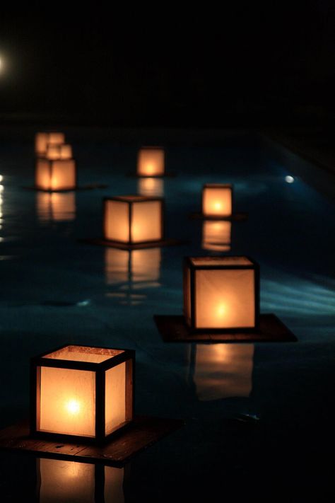 Floating lanterns in the pool Floating Candle In Pool, Floating Pool Lanterns, Pool Tea Lights Floating Candles, Floating Pool Candles, Floating Candle Water Beacs, Floating Lanterns, Amalfi Coast Wedding, Pool Decor, Amalfi Coast