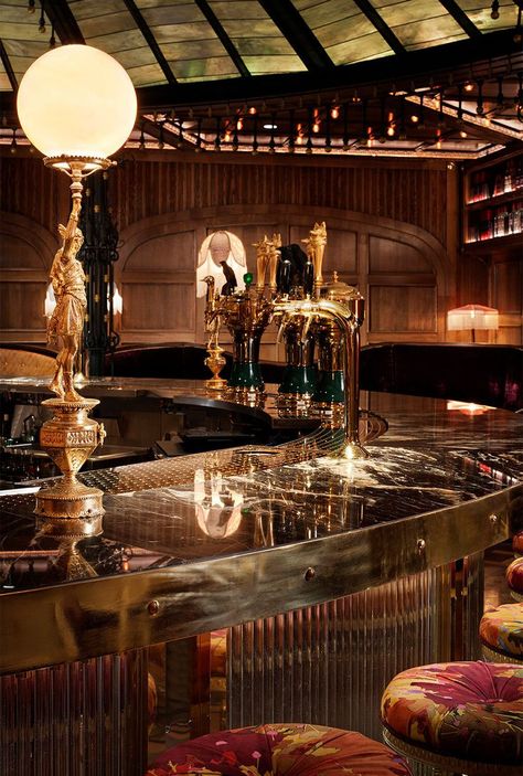 Raised By Wolves Bar Detail Marble Bar Top, Gold Metal Edge Banding, Gold Drink spouts Fiber Optic Ceiling, Marble Bar Top, Pierre Frey Fabric, Oak Fireplace, Fireplace Facade, Raised By Wolves, Marble Bar, Fountain Feature, Bottle Display