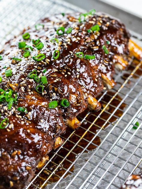 These instant pot Asian ribs are so tender, juicy, and easy to make! Fall off the bone baby back ribs covered in a sweet and tangy Asian soy glaze! The best pressure cooker Asian ribs you’ll ever taste! #instantpotribs #instantpotrecipes #instantpotasianribs #asianribs #babybackribs #pressurecookerribs | drivemehungry.com Soy Glaze Recipe, Asian Ribs Recipe, Instant Pot Asian, Pressure Cooker Ribs, Asian Ribs, Soy Glaze, Baby Back Pork Ribs, Rib Sauce, Best Pressure Cooker