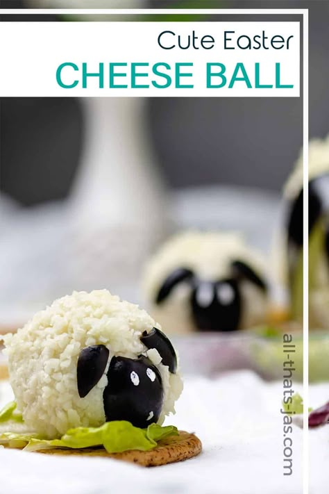 Make this adorable Easter sheep and lamb cheese ball to celebrate the season! This is one of those easy recipes that you can double or even triple if it's going as an appetizer at your next party. | allthatsjas.com | #appetizer, #cheeseball, #EasterRecipe #recipeofthemonth #Easterlamb #allthatsjas #recipes #easyrecipes Easter Cheeseball, Finger Food For A Crowd, Easter Cheese Ball, Cheese Log Recipes, Easter Cheese, North American Food, Snack Appetizers, Easter Food Appetizers, Easter Dinner Table