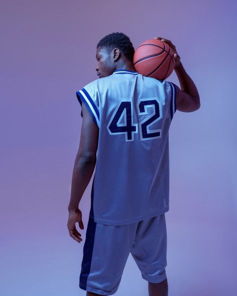 Basketball player poses with ball, back ... | Premium Photo #Freepik #photo #people #man #gym #basketball Sports Poses Reference, Basketball Photoshoot Ideas, Cool Basketball Pictures, Basketball Editorial, Basketball Pose, Basketball App, Kobe Jersey, Sports Jersey Outfit, Shooting Basketball