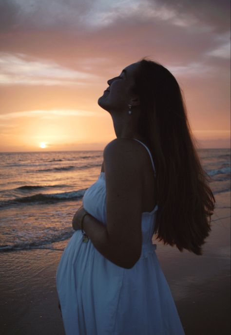 Sunset beach maternity photography - woman in white linen dress on beach Pregnant Beach Aesthetic, Sunset Pregnancy Announcement, Pregnant Beach Pictures, Pregnancy Announcement Photos Beach, Pregnancy Shoot Beach, Aesthetic Pregnancy Photos, Pregnancy Beach Photos, Pregnancy Photos Beach, Pregnancy Announcement Beach