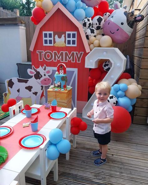 Farm themed birthday party idea featuring Farm backdrop, cake plinth and cow cut out. This stunning party was created by… | Instagram Farm Backdrop Barnyard Party, Diy Farm Backdrop, Farm Animal 2nd Birthday Party Boy, Cake Plinth, Farm Backdrop, Birthday Party Idea, Farm Themed Birthday Party, Barnyard Party, Farm Birthday Party