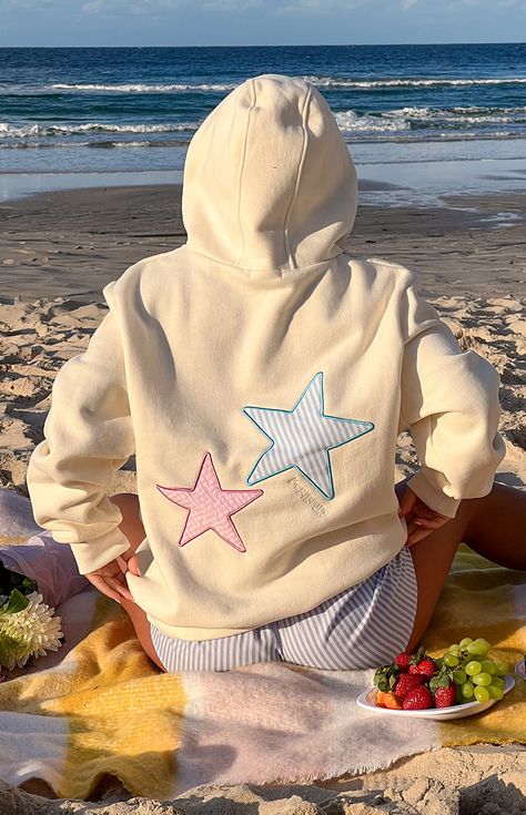 RESTOCK: Tuesday 17th September 8am AEST   Cream Star Graphic Hoodie  How to style: Love a graphic hoodie ()? Us too! This gorgeous cream hoodie will keep you cosy all through winter () while looking effortlessly cool with the star patch features. Wear with baggy jeans for a comfy fit and elevate with some gold hoops () to finish!  Features:       * Fleece lined    * Long sleeves    * Ribbed sleeve cuffs and bottom hem    * Mid weight material    * Pull on design    * Front pockets    * Hooded s Cute Sweatshirts And Hoodies, Cute Trendy Hoodies, Star Patchwork Hoodie, Cute Graphic Hoodies, Cute Iron On Patches Sweatshirt Ideas, Hoodies That Hoodie, Patch Hoodie Ideas, Fall Patchwork Hoodie, Homemade Sweatshirt Ideas