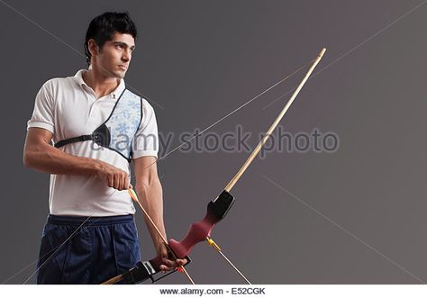 Holding Bow And Arrow Reference, Holding Bow And Arrow, Real References, Bow And Arrow, Bow Arrows, Free Stock Photos Image, Photo Reference, Gray Background, Stock Photography