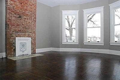 Master Bedroom Renovation Inspiration: color pallet. Exposed red brick, grey walls, white trim, dark floor. Navy accents. Exposed Red Brick, Dark Floor Living Room, Grey Walls White Trim, Red Brick Fireplace, White Family Rooms, Red Brick Fireplaces, Painted Brick Fireplaces, Living Room Decor Gray, Renovation Inspiration