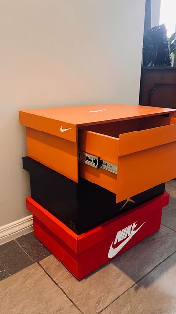 Bespoke Wood Creations on Instagram: "Had fun building and designing this custom Nike bedside cabinet. Featuring three drawers, mitred drawer fronts, and soft close runners. Have had a lot of interest in this cabinet. Thinking about making only a couple more, as one off bespoke pieces. If you wanna have a crack at building one, there will be plans available soon. Have a great Christmas, Cheer Alex #sneakerheads #customfuniture #bespoke #nike #michaeljordan #nikesoccer #woodworker #woodorganizer #solfclose #mitreddrawerfronts #shoestyle #shoeporn #shoes #shoestorage" Men Shoe Storage Ideas, Sneaker Room Decor, Sneaker Head Room Ideas Boy, Nike Bedroom Ideas, Nike Shoe Box Storage, Nike Decor, Sneakerhead Bedroom, Nike Shoe Box, Sneaker Room