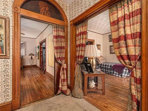 Check out the interior! Circa 1895 in New Hampshire. $137,500 - The Old House Life 1890s House Interior, 1890s Decor, Curved Archway, 1910s House Interior, Tiled Hearth, Snow Mobile, Mountains Snow, Antique Home, Entrance Foyer