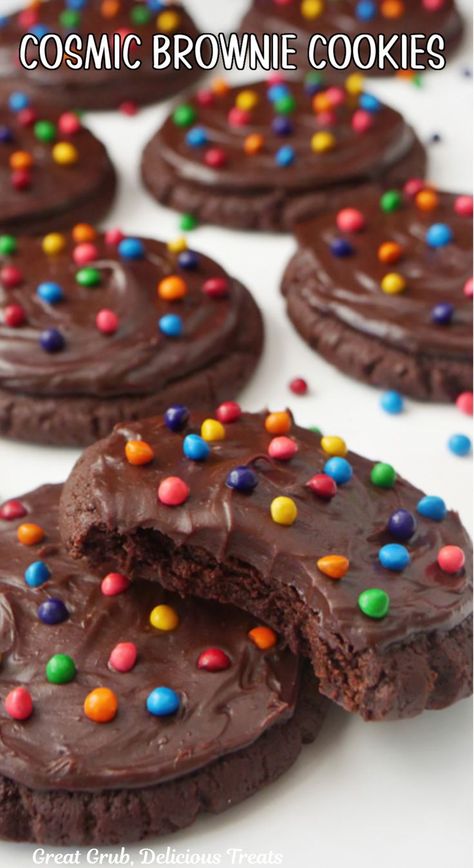 Cosmic brownie cookies topped with chocolate frosting and bright candies on a white tray. Chewy Brownie Cookies, Cosmic Brownie Cookies, 3 Ingredient Butter Cookies, Chocolate Walnut Brownies, Smores Cookie, Chocolate Pudding Desserts, Brownie Treats, Cookie Contest, Cosmic Brownies