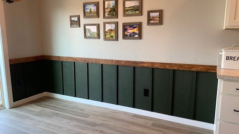 Board And Batten Wall Stained Wood, Stained Chair Rail Ideas, Bottom Half Accent Wall, Half Black Wall Dining Room, Stained Wood Chair Rail, Olive Green Wood Accent Wall, Board And Batten Wall With Stained Wood, Green Batten Board Walls, Bottom Half Wall Ideas