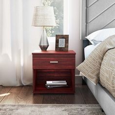 This easy style storage nightstand with drawer is a fantastic option with modern yet classic appeal and bedside storage. Crafted with durable hardwood MDF, this nightstand has a single drawer with euro glides and storage cubby. This nightstand is the ideal height for lower-profile beds. This could also be used under a student desk for additional storage in your home office, or end tables. Ships in 1 box, and assembles in under 30 minutes. Color: Red. Cherry Wood Nightstand, One Drawer Nightstand, Storage Nightstand, Tidy Bedroom, Simple Bedside Tables, Contemporary Bedrooms, Storage Cubby, Black Nightstand, Small Bedside