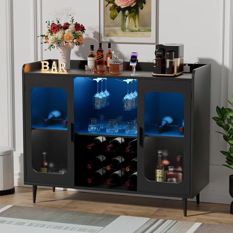 PRICES MAY VARY. Wine Bar Cabinet with Smart Led Light: The freestanding liquor cabinet with RGB LED lights features over 60000 colors and 29 flashing modes via APP or remote control, which provides more choices for the party atmosphere. With Led music sync function and built-in sensitivity adjustable mic, the color of led light will change with the rhythm of the sound and music. Just enjoy your party. Coffee bar cabinet with Charging Station: This bar cabinet is equipped with a built-in power s Liquor Cabinet Bar, Wine Rack Table, Coffee Bar Cabinet, Cabinet Bar, Wine Bar Cabinet, Modern Buffet, Home Coffee Bar, Home Bar Furniture, Kitchen Cabinet Storage