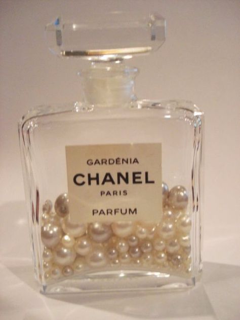 Old perfume bottles may seem useless. See 10 ingenious ways to reuse them instead Gardenia Chanel, Perfume Bottle Collection, Chanel Room, Chanel Perfume Bottle, Vanity Shelf, Chanel Decor, Old Perfume Bottles, Empty Perfume Bottles, Chanel Party