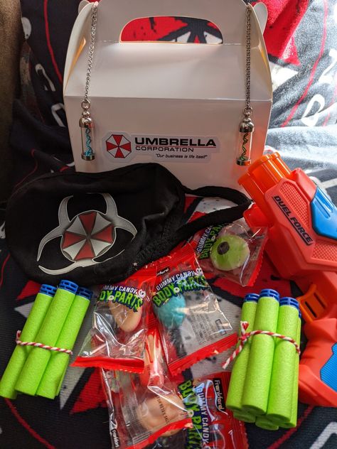 Resident Evil Themed Party, Resident Evil Birthday Party Ideas, Resident Evil Party Ideas, Evil Masks, Resident Evil Birthday, Evil Mask, Bd Ideas, Horror Merch, Umbrella Corporation