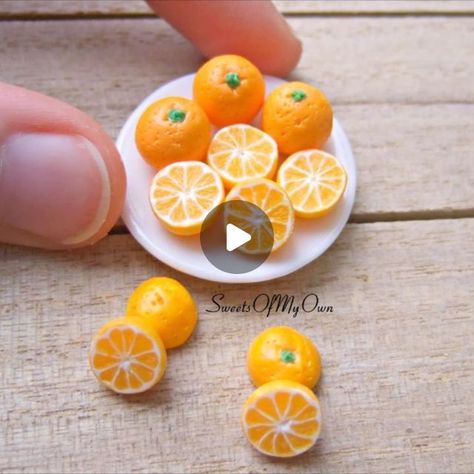 Joanna Tomlinson on Instagram: "⠀⠀⠀⠀⠀⠀⠀⠀⠀ Miniature Oranges - Tutorial Video. 😄 ⠀⠀⠀⠀⠀⠀⠀⠀ Here's how I created my Polymer Clay Oranges in my last post. 😁 ⠀⠀⠀⠀⠀⠀⠀⠀ The tough part of this is getting the cane right. I did a test on the orange colours before making this cane (by baking small amounts of each orange colour). ⠀⠀⠀⠀⠀⠀⠀⠀⠀ Extras: - I use translucent white with a small bit of orange + sunflower yellow. Which gave me the pale orange inside colour. - Cut into segments. - Round the top of each segment then add white to one side. - Fill the spaces (at the top) with white. - Add a layer of white + a layer of orange on top of the segments. - Roll out your cane and begin cutting. - Round into a small ball and cut in half. - I detailed each segment with a needle. - Detail the back and bake. Polymer Clay Fruit Tutorial, Orange Polymer Clay, Oranges Fruit, Clay Videos, Orange Sunflowers, Polymer Clay Cane, Sunflower Yellow, Pale Orange, Orange Colour